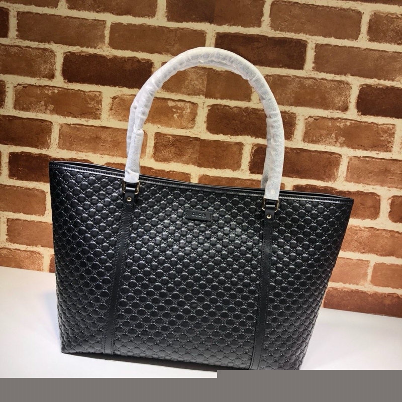 G*u*i shopping bags